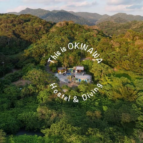 Property building, Day, Natural landscape, Bird's eye view, Text overlay, Mountain view