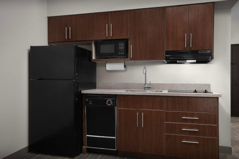 Kitchen or kitchenette, dishwasher, microwave, stove