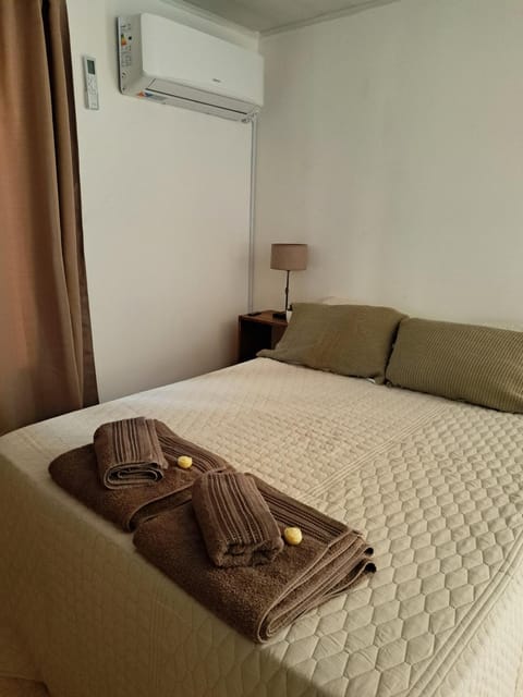 Bed, Photo of the whole room, Bedroom, towels, air conditioner