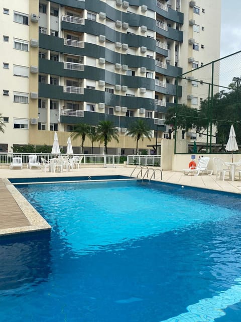 Property building, Day, Pool view, Swimming pool, sunbed