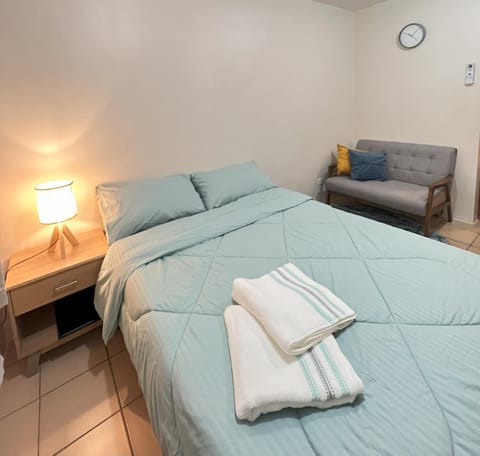 Bed, Living room, Seating area, Bedroom