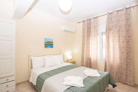 Bed, Photo of the whole room, Bedroom, towels, air conditioner