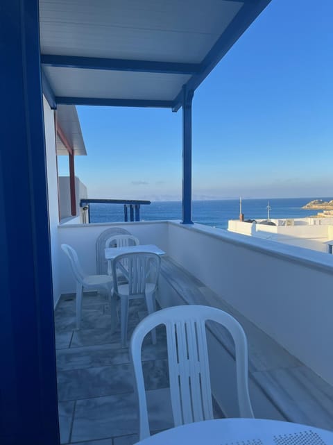 View (from property/room), Balcony/Terrace, Seating area, Beach, Mountain view, Sea view