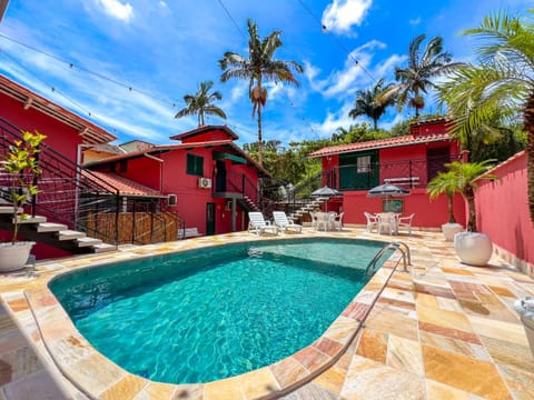 Property building, Day, Pool view, Swimming pool, sunbed