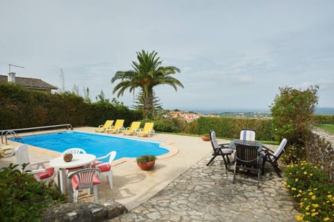 Property building, Living room, Swimming pool