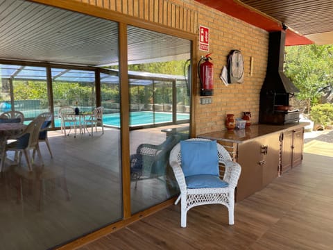Patio, Day, BBQ facilities, Darts, View (from property/room), Balcony/Terrace, Living room, Seating area, Dining area, Pool view, Swimming pool, sunbed