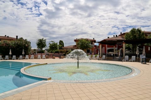 Villaggio Sant'Andrea - apartment with gardenview Apartment in Friuli-Venezia Giulia