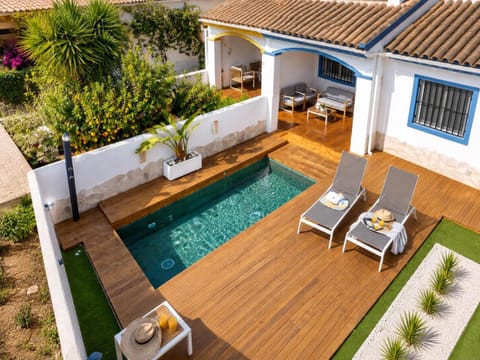 Property building, Living room, Swimming pool, sunbed