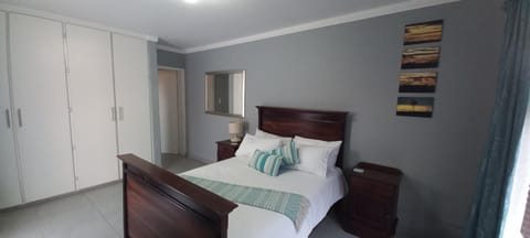 Bed, Photo of the whole room, Bedroom, hair dresser, towels, wardrobe