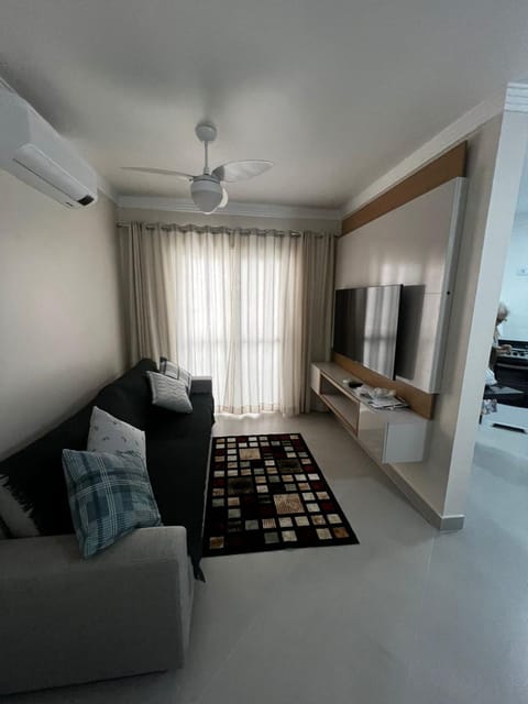 Communal lounge/ TV room, TV and multimedia, Living room, Seating area, air conditioner