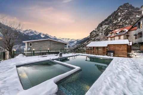 Property building, Day, Natural landscape, Winter, Mountain view, Pool view, Swimming pool