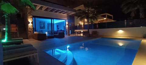 Patio, Night, Balcony/Terrace, Pool view, Swimming pool, Swimming pool, sunbed