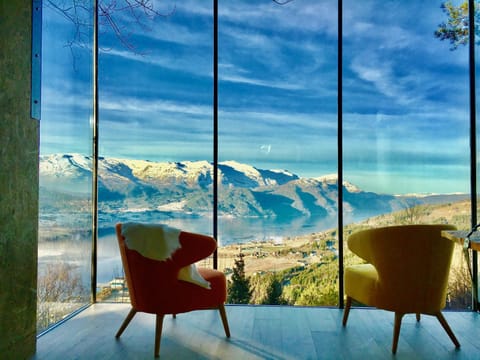Day, Natural landscape, Living room, Seating area, Mountain view