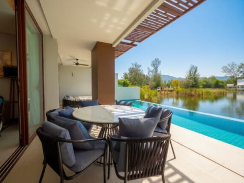 Patio, Day, Natural landscape, Seating area, Dining area, Pool view, Swimming pool, sunbed