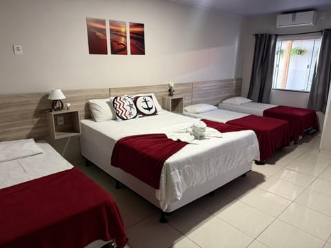 Bed, Photo of the whole room, Bedroom, towels, air conditioner