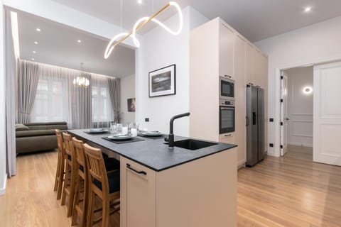 Dining area, minibar, oven, stove