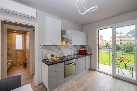 Kitchen or kitchenette, Living room, stove