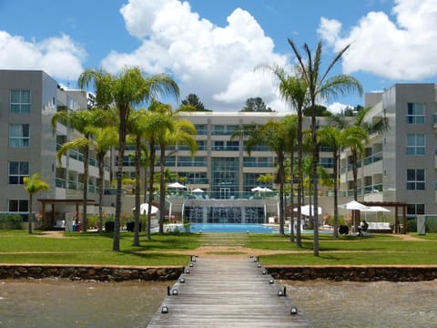 Property building, Facade/entrance, Day, Garden, Garden view, Lake view, Pool view, Swimming pool