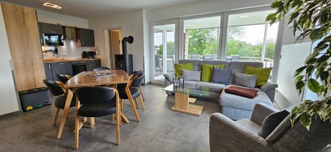 Kitchen or kitchenette, Living room, Seating area, Dining area