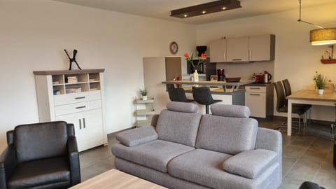 Kitchen or kitchenette, Living room, Seating area, Dining area