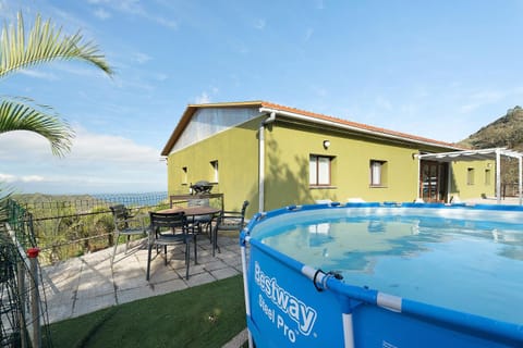 Property building, Living room, Swimming pool