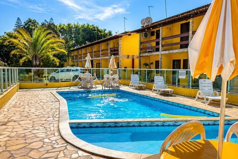 Property building, Day, Pool view, Swimming pool, sunbed