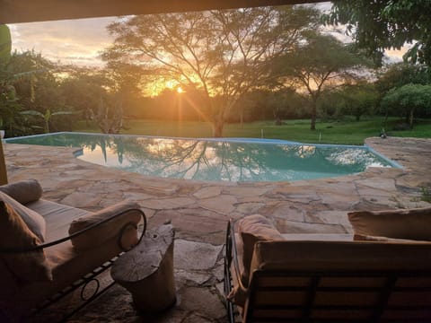 Patio, Natural landscape, Seating area, Pool view, Swimming pool, Sunset