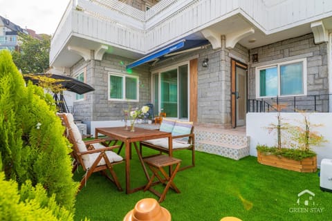 Property building, Patio, Garden, Seating area, Garden view
