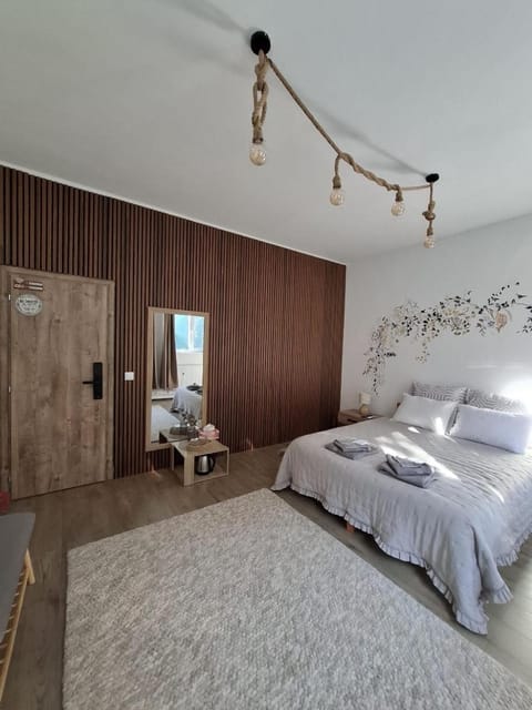 Property building, View (from property/room), Decorative detail, Decorative detail, Bedroom, Time of day, furniture, furniture, internet, internet, internet, towels
