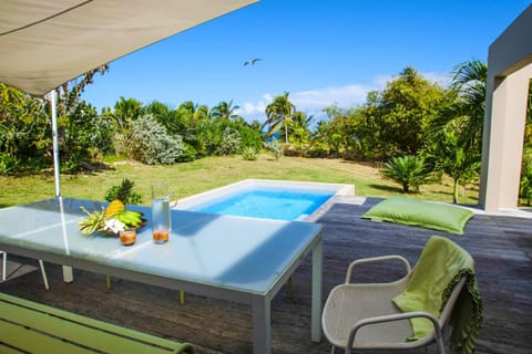 Patio, Spring, Day, Natural landscape, Garden, Dining area, Garden view, Pool view, Swimming pool, sunbed