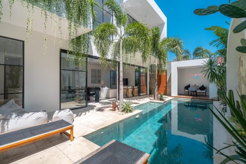 Property building, Patio, Day, Seating area, Pool view, Swimming pool, sunbed