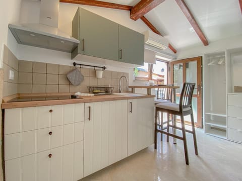 Kitchen or kitchenette, stove