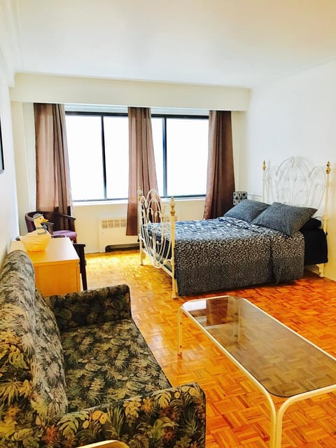 Bed, Living room, Seating area, Bedroom