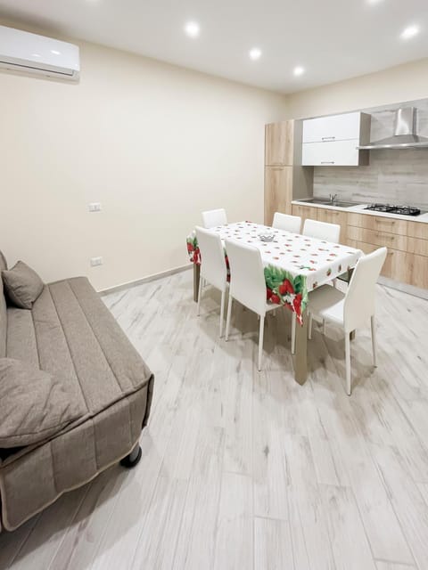 Living room, Dining area, stove, air conditioner