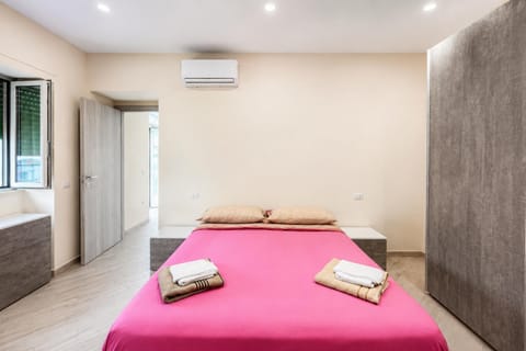 Bed, Photo of the whole room, Bedroom, towels, air conditioner