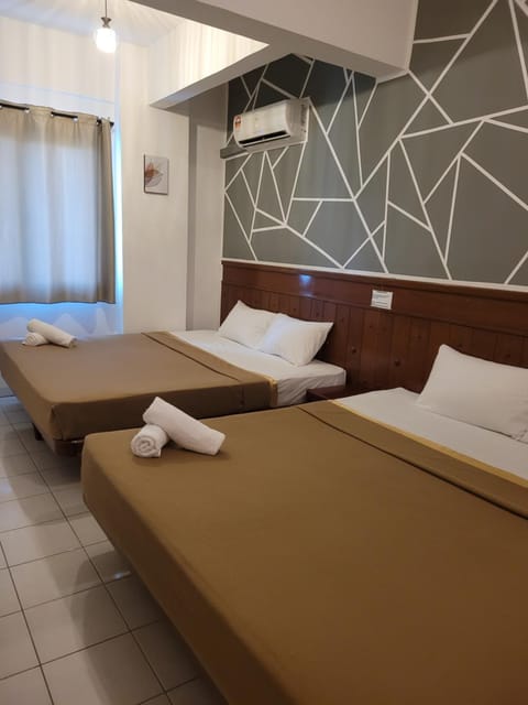 Bed, towels, air conditioner