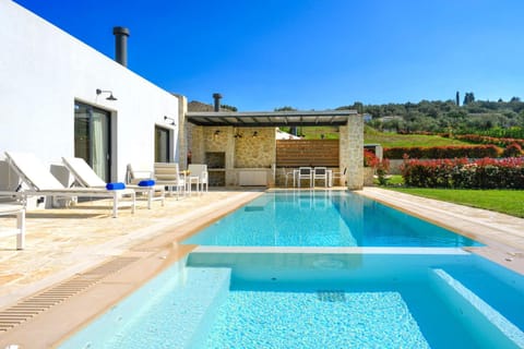 Patio, Day, Natural landscape, Pool view, Swimming pool, sunbed