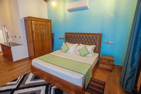 Bed, Bedroom, towels, wardrobe, air conditioner