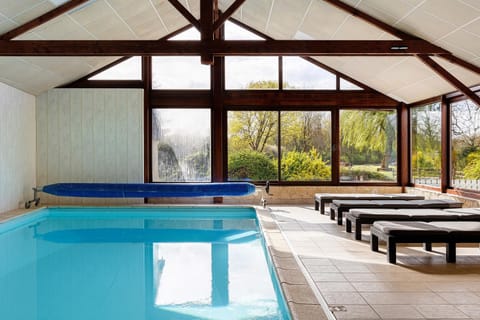 Property building, Living room, Swimming pool