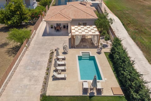 Property building, Patio, Pool view, Swimming pool, sunbed