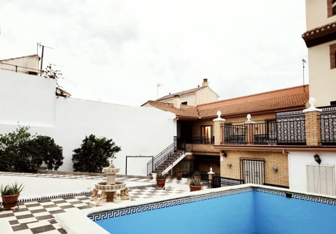 Property building, Patio, Off site, Decorative detail, Garden view, Swimming pool
