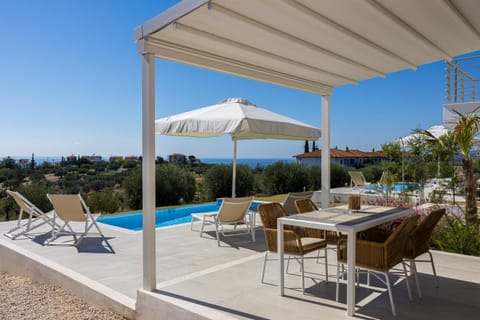 View (from property/room), Balcony/Terrace, Dining area, Swimming pool