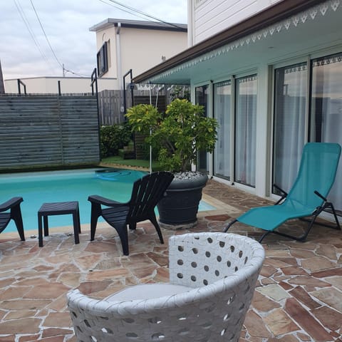 Swimming pool, sunbed