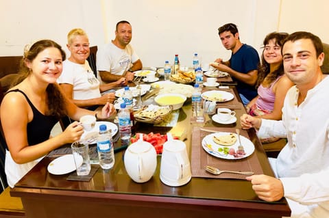Asian breakfast, group of guests