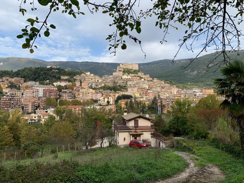 Property building, Nearby landmark, Natural landscape, City view, Mountain view