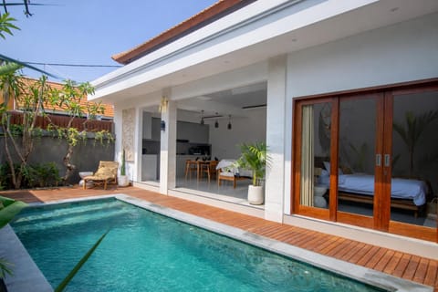 Property building, Patio, Swimming pool, sunbed