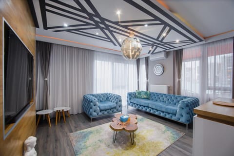 TV and multimedia, Living room, Seating area, air conditioner, air conditioner