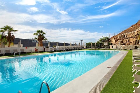 Property building, Living room, Swimming pool