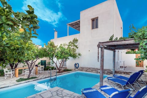 Property building, Patio, Swimming pool, sunbed