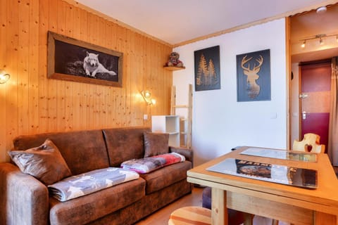 Bed, Living room, fireplace, kitchen